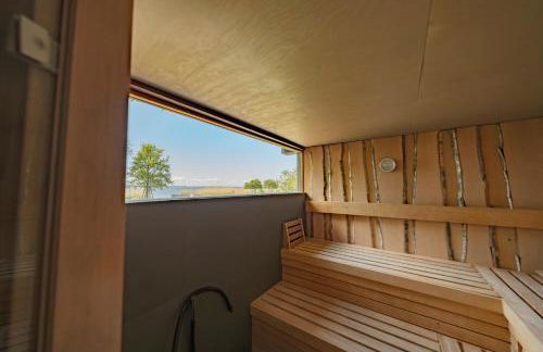 Ferienhaus Peeneblick - exklusives Traumhaus in Direktlage am Wasser mit Bootssteg und Aussensauna - Foto 36