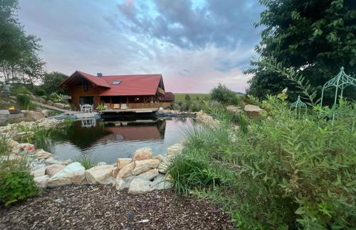 Blockbohlen HolzHaus mit Sauna, Outdoor Jacuzzi und BadeTeich - Foto 1