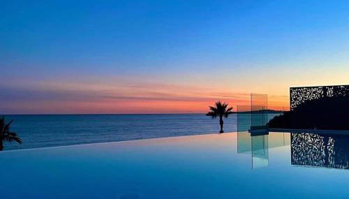 Appartement climatisé les pieds dans l'eau pour 6 personnes avec 1 suite parentale, 1 chambre double et 1 mini chambre Piscine sur le toit clim garage - Foto 2