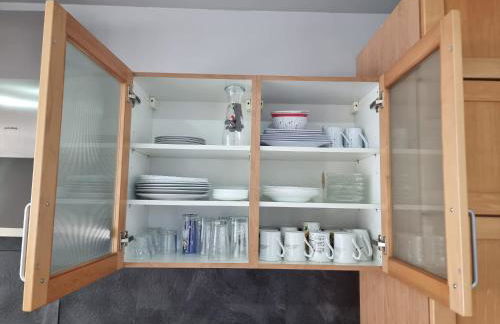 Gemütliche Ferienwohnung mit 1 Schlafzimmer, Wohnzimmer mit Schlafcouch & voll ausgestattete Küche - Foto 11