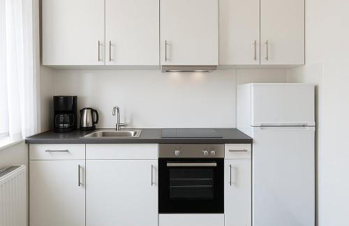 Polsumer Residence Moderne Unterkunft für Monteure & Familien nahe Veltins-Arena, Movie Park, Nordsternpark, Amphitheater & Autobahnen A2 & A42 mit Balkon - Photo 3