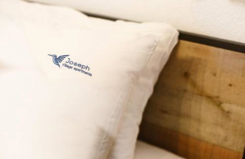 Joseph Village Apartments - Foto 17