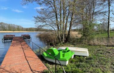 Rumiane pola - stodoła na Mazurach z widokiem na jezioro - Foto 67