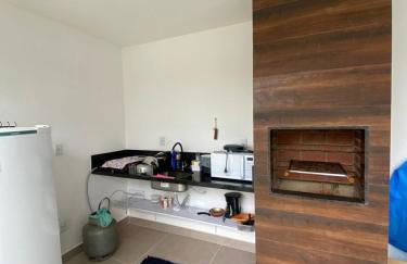 Suíte privativa aconchego a alguns passos da praia - Foto 6