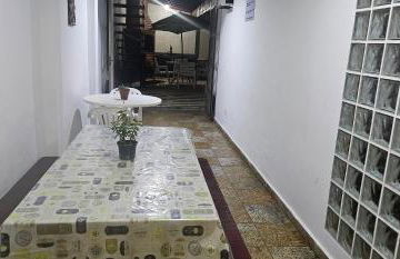 Belíssima Casa a Beira Mar com Piscina Aquecida Cobrado a Parte, 5 Quartos com Ar Condicionado, Amplo Salão de Jogos com Mesas de Bilhar e Pebolim, Amplo Espaço Externo com Churrasqueira em Deck Gourmet Coberto frente a Piscina,Tudo isso á Beira Mar - Photo 11