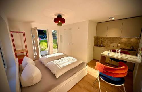 Stylisches See-Studio mit Badezugang & Garten - Photo 1