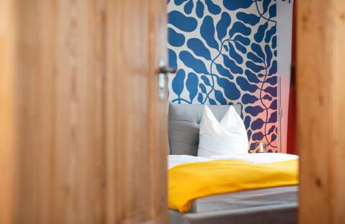 Bunter Hund Apartments - Zentrales Apartment, Parkplatz, Wintergarten, Kinderzimmer - Foto 1