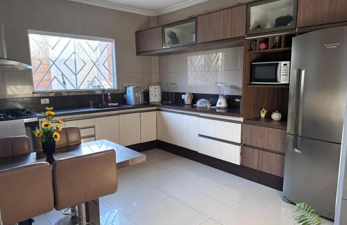 Sobrado top com piscina, espaço gourmet, próximo à praia com Ar Condicionado - Foto 16