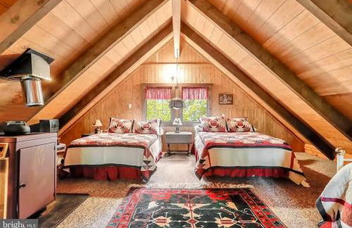 Log Cabin w Loft, Hot Tub, Deck, Fire Pit, & WiFi - Photo 16