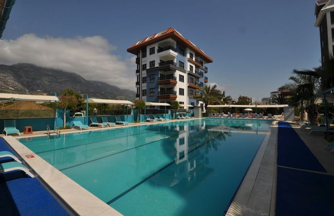 ACG Apartments - Foto 1