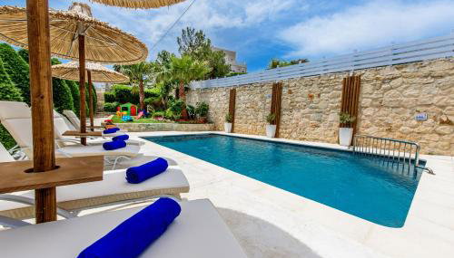 Elmyra Villa, Heated Pool & Walking to beach, By ThinkVilla - Foto 3, Garden