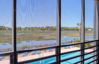 Bella Vista: Marshfront Condo 1 Block To The Beach. Pool & Hot Tub-1st Floor - Photo 10