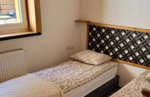 Leśna Kryjówka domki w lesie - Foto 17