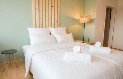 Stadtjuwel I Balkon I 6 Min zum See - Foto 9