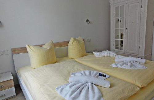 3 Zimmer Ferienwohnung Haus Meeresblick mit Meerblick A005 mit Südterrasse und Strandkorb - Foto 9