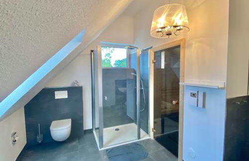 Ferienhaus MOIN. am Harkebrügger See mit Sauna - Foto 13