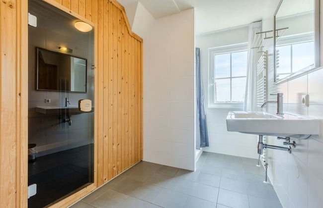 Beachside Villa + Sauna - Photo 16