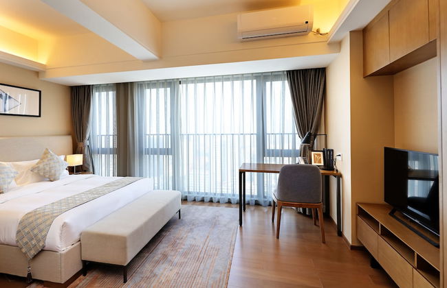 Yuwa Serviced ApartHotel - Photo 15