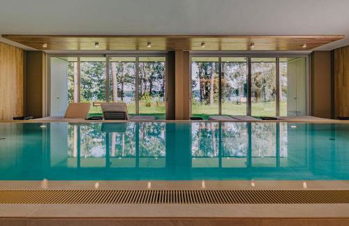 TheChipp - Designapartment mit Seeblick, Pool, Sauna & Kamin - Photo 2