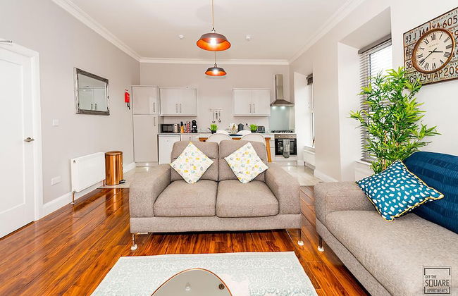 Off The Square Apartments - Foto 1