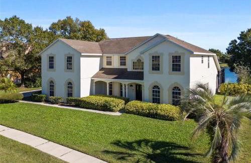 BRAND NEW! Lakefront 9BR Pool Hot Tub Outdoor Kitchen BBQ Theater 2 miles Disney - Foto 31