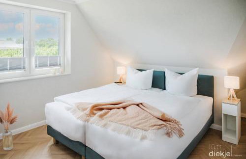 Lütt Diekje - Luxus-Haus mit Meerblick, Sauna & Kamin - Photo 13