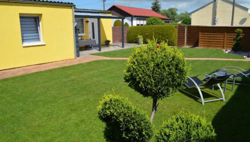 Ferienhaus "Am See" - Foto 3, sunbed, Garden view