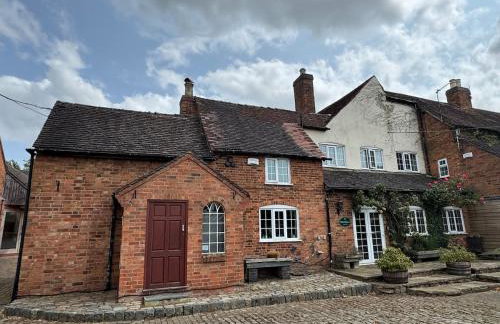The Farmhouse at Nettle Hill - Photo 1