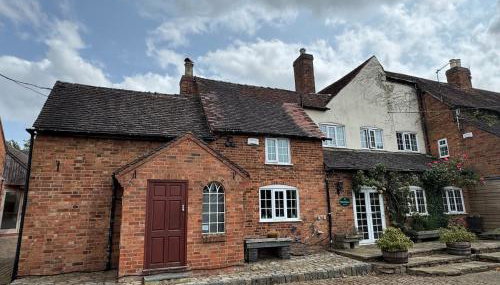 The Farmhouse at Nettle Hill - Foto 1