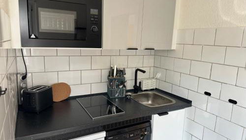 Apartment Südhöhen - für Geschäfts- Privatreisen mit naher Autobahnanbindung Düsseldorf & Köln - Foto 4, stove