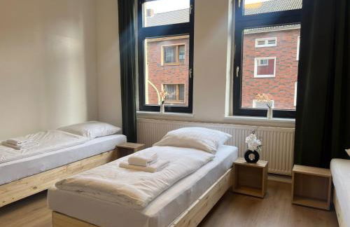 Duisburg - 2 Schlafzimmer Monteurwohnung - Vollausgestattete Küche - WIFI - Foto 24