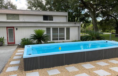 Reel relaxing across from River in Huge 24 foot Swim Spa - Photo 7