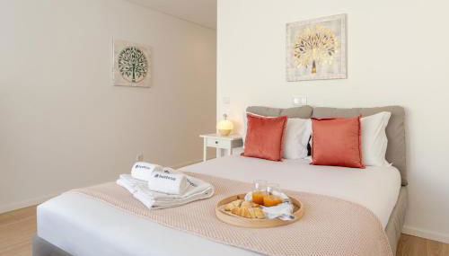 HostWise Cozy Studio with Balcony and Garage - Photo 1, towels