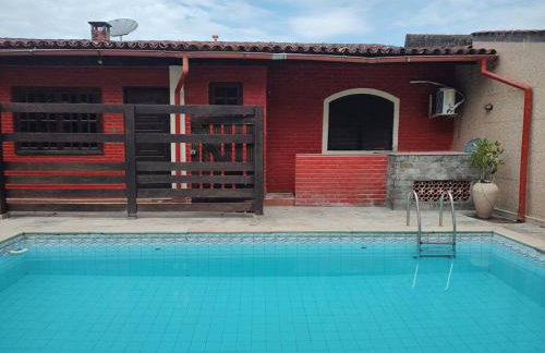 Ampla casa em condomínio a 300mt da praia - Foto 27