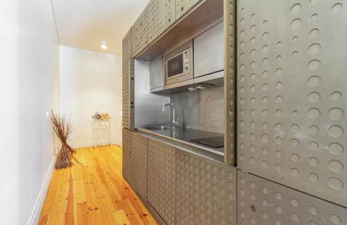 Cozzy Apartment at Praça dos Loios - Photo 11