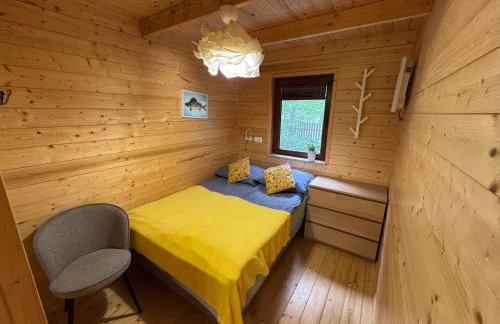 Domki przy jeziorze z prywatną plażą w Borach Tucholskich Pensjonat Alicja wczasy z dziećmi nowe luksusowe domki na skraju jeziora i lasu - Foto 38