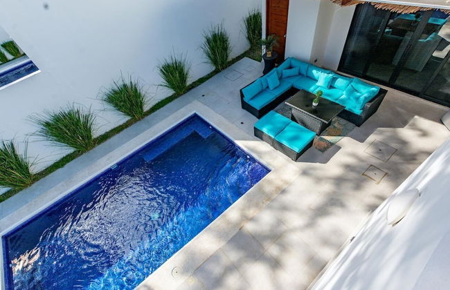 Ultramodern Townhome with an Inviting Coastal Design and Lush Outdoor Oasis with a Private Pool - Photo 23