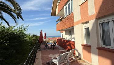 Apartamento con terraza en Mogro Playa de Usil - Foto 2, sunbed