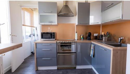 Appartement T2, fonctionnel, Parking,balcon ,2 minutes gare ,17 minutes Paris - Foto 4, stove