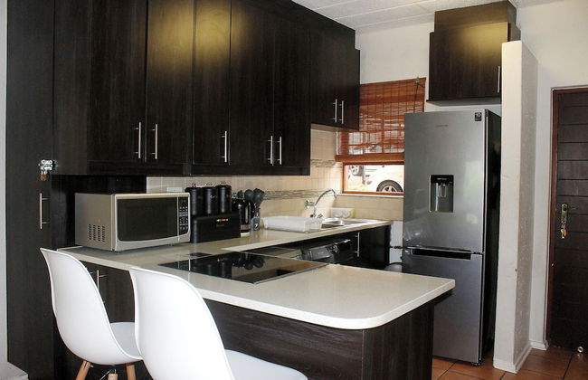 Exquisite 2 Bedroom Garden Townhouse in the Heart of Fourways - Photo 13