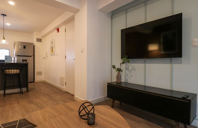 w Impressive 1BR Near Central Restaurante - Foto 10