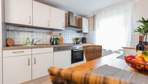 BG Living & Hosting - Mosel-Fachwerkhaus nahe Calmont Klettersteig - 2 Schlafzimmer, Parkplatz, WLAN & Netflix, 5 Personen - Foto 3, stove, dishwasher, toaster