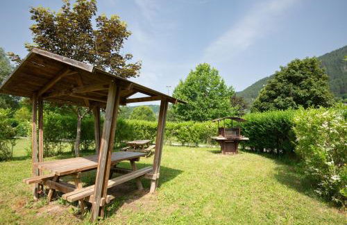 Gîte Chalet 4 pers. - Camping Les Berges du Bramont - Foto 9