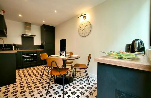 Montmartre en rez-de-jardin - Foto 14