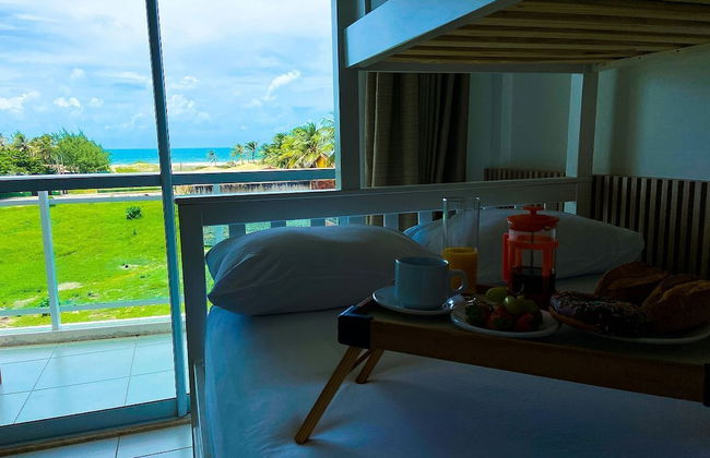 Apto vista mar incrível por Be My Guest - Photo 9