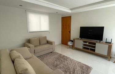 Apartamento em Poços - Varanda com Churrasqueira - Foto 10