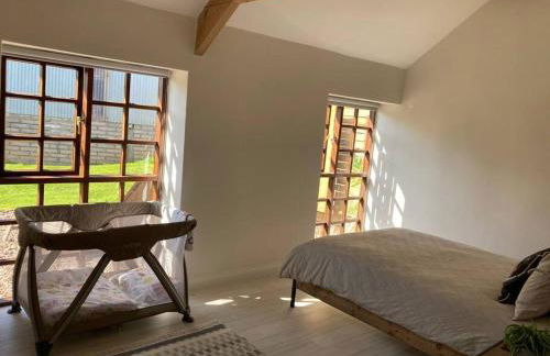 Light & Airy Vaulted Barn Conversion with a View - Photo 14