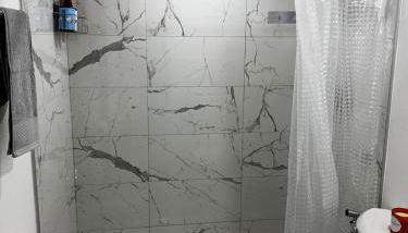 The Palm Stay Near SWF Airport laundry - Foto 4