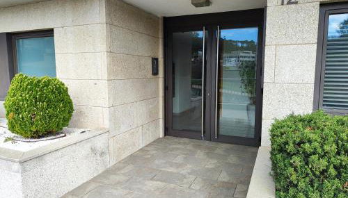 Un rincón con vistas a la Ría, playa y parking. - Foto 3, Lobby or reception