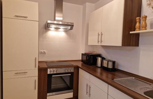 Cozy Apartment: Design Superior Suite Zentral - Küche - Balkon - Foto 34